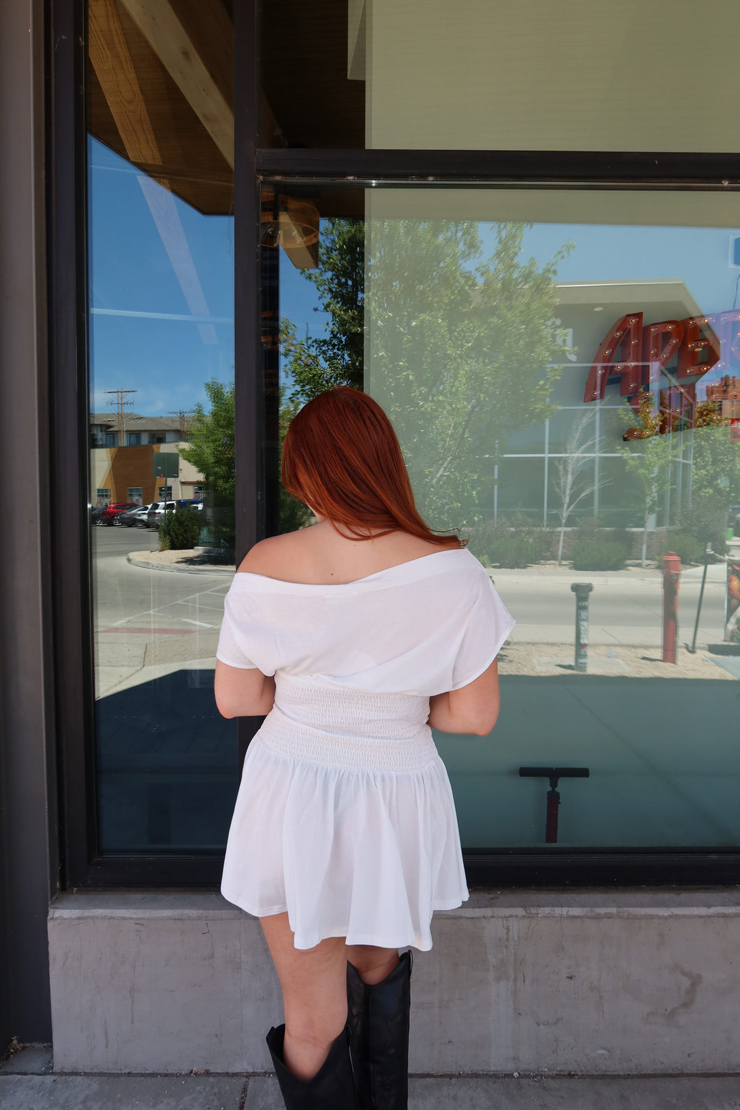 The Asha Off-Shoulder Smocked Mini Dress