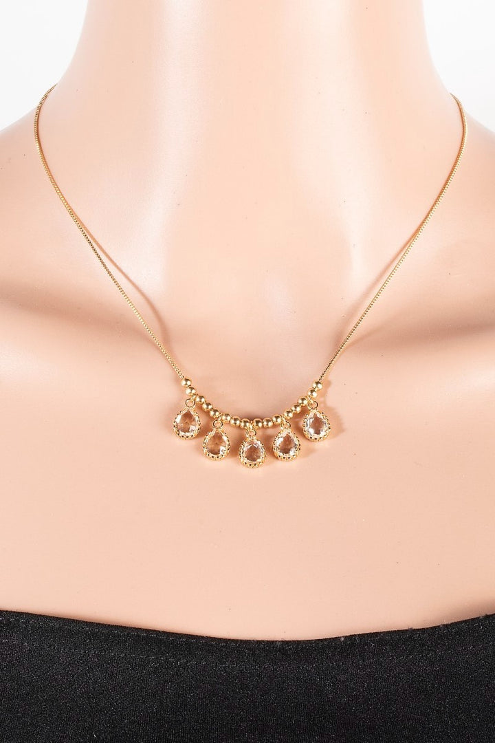 GLASS TEAR CHARMS NECKLACE