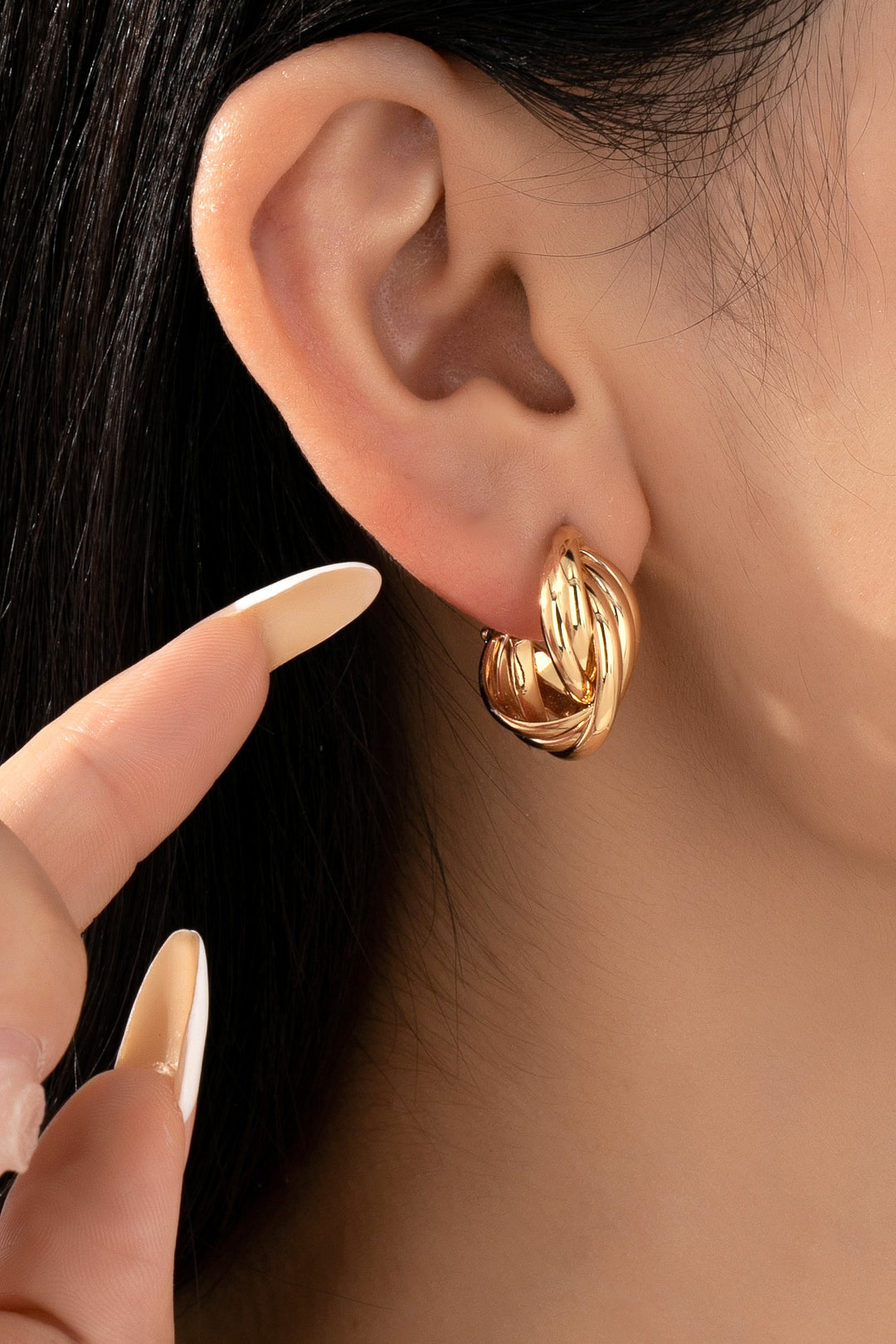 SCULPTURAL TWISTED HOOP EARRINGS