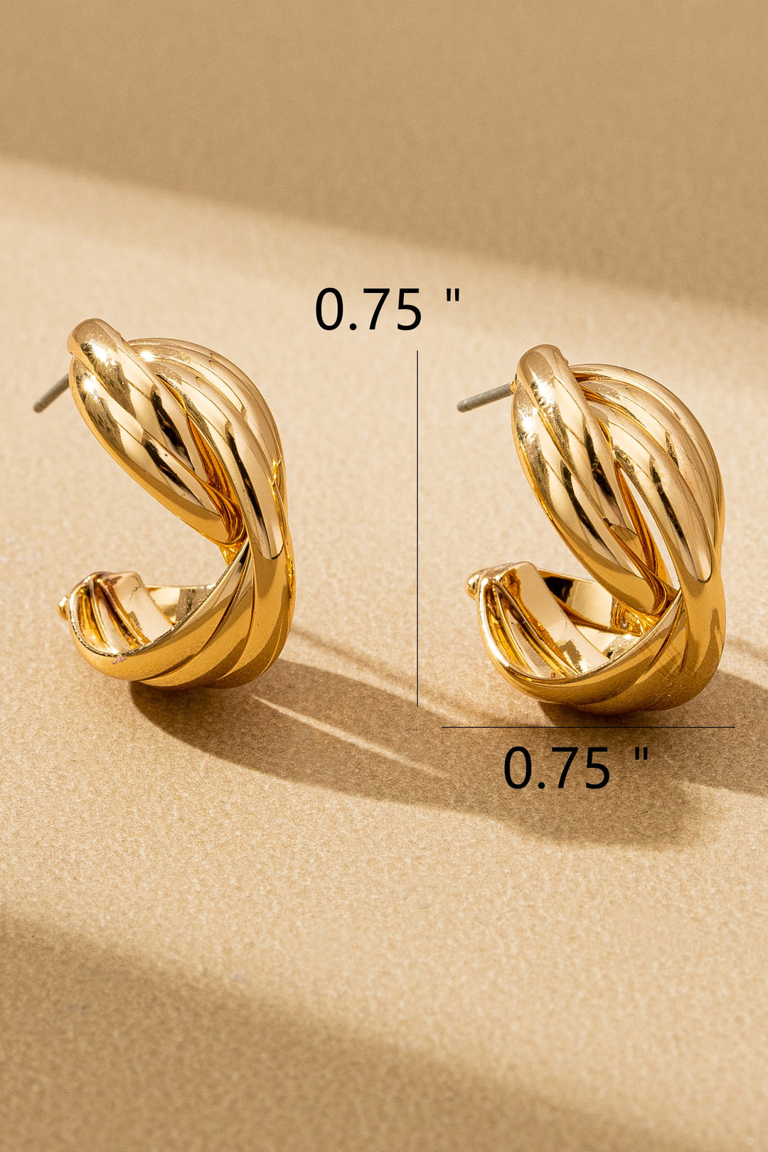 SCULPTURAL TWISTED HOOP EARRINGS