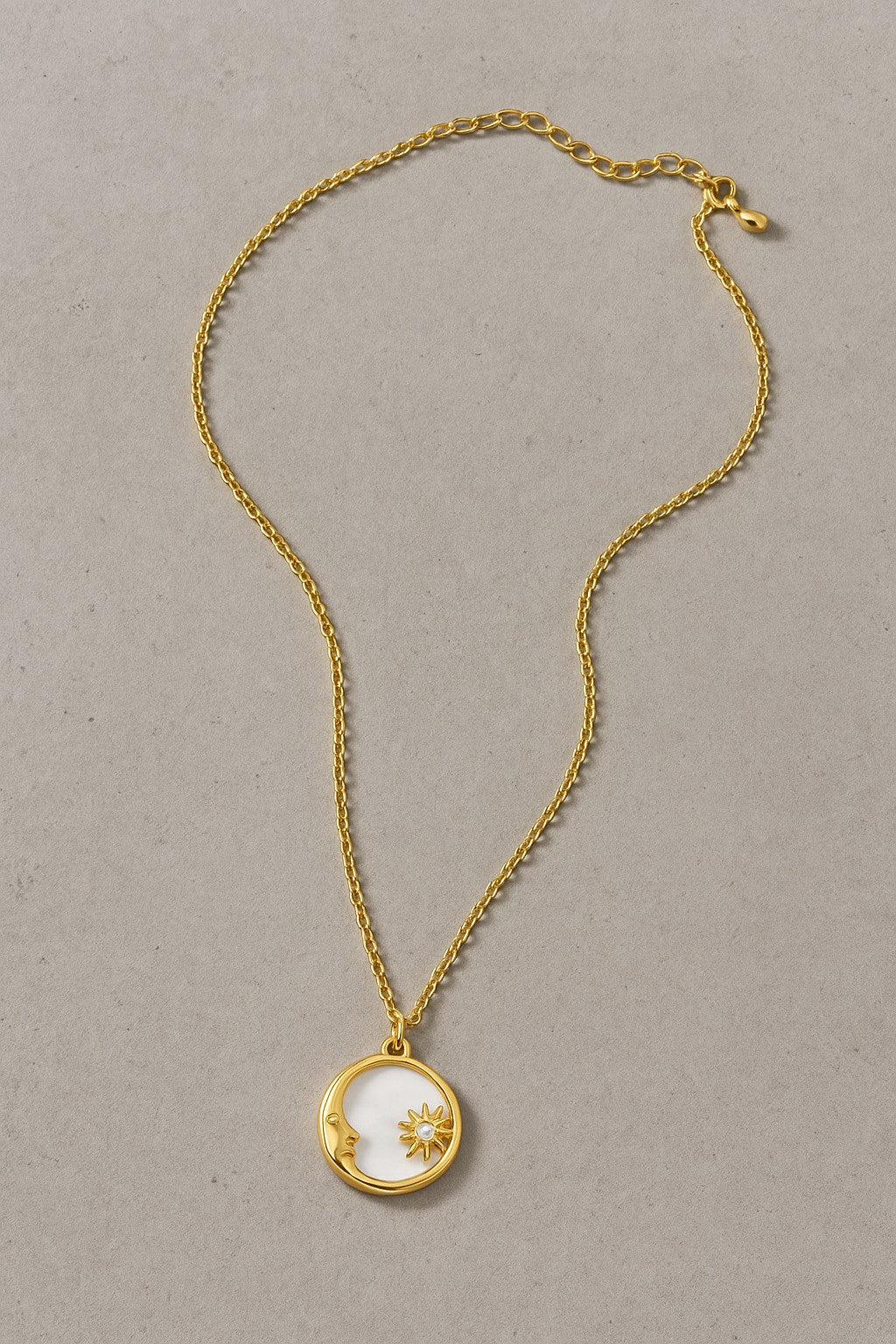 CELESTIAL SUN AND MOON PENDANT