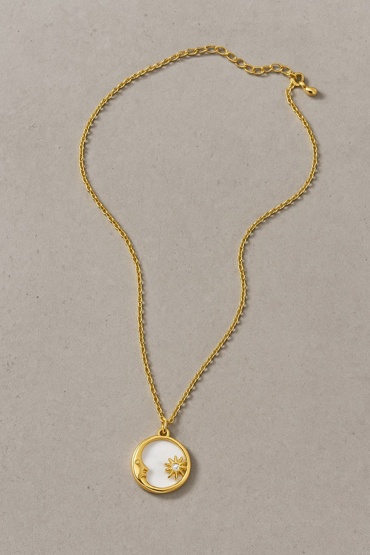 CELESTIAL SUN AND MOON PENDANT