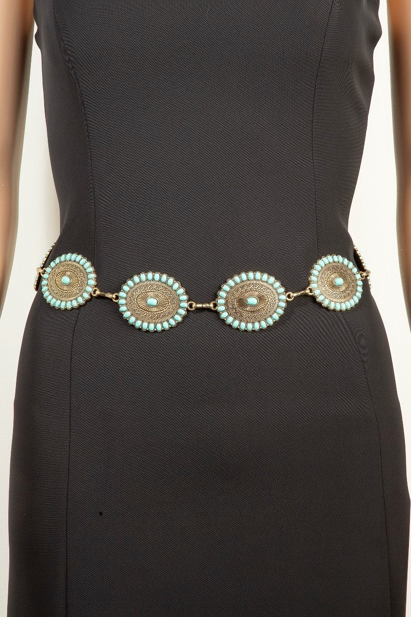 The Turquoise Concho Chain Belt - Styled on Mannequin Over Black Dress Showing Full Belt Width, Concho Discs & Turquoise Cabochon Detail