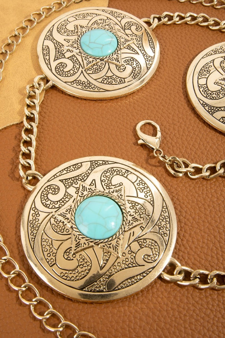The Sedona Turquoise Round Concho Chain Belt in Antique Silver - Close-Up Detail Showing Celtic Scroll Engraving, Turquoise Center Stone & Curb Chain Links on Two Concho Discs