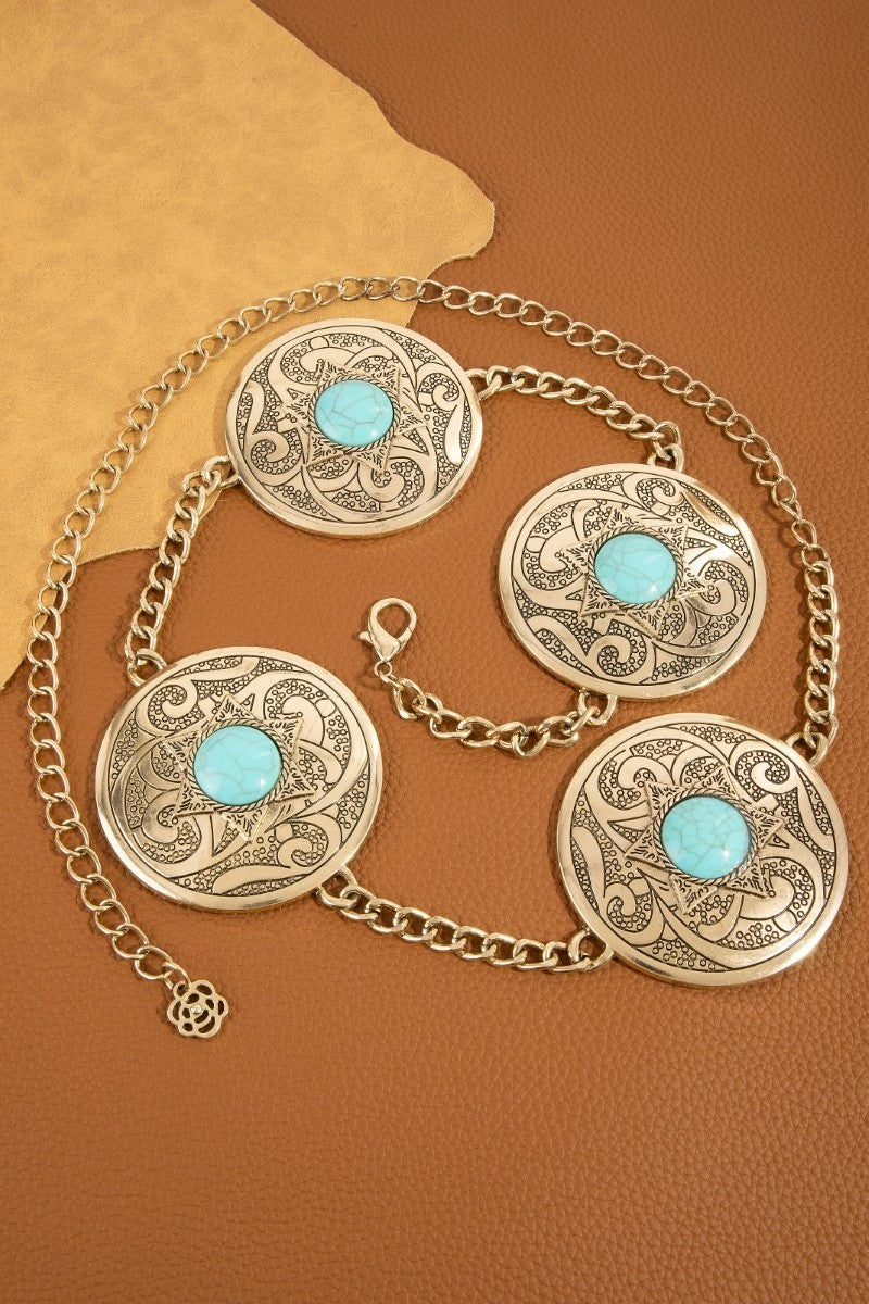 The Sedona Turquoise Round Concho Chain Belt in Antique Silver - Flat Lay on Tan Leather Surface Showing Full Belt with Four Round Concho Discs, Chain Links & Lobster Clasp