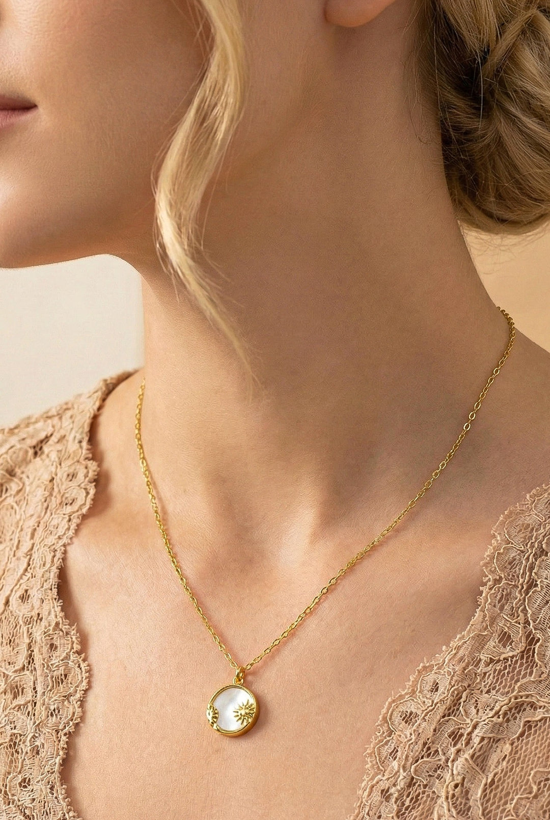 CELESTIAL SUN AND MOON PENDANT