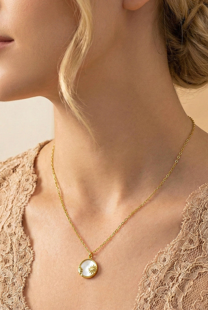 CELESTIAL SUN AND MOON PENDANT