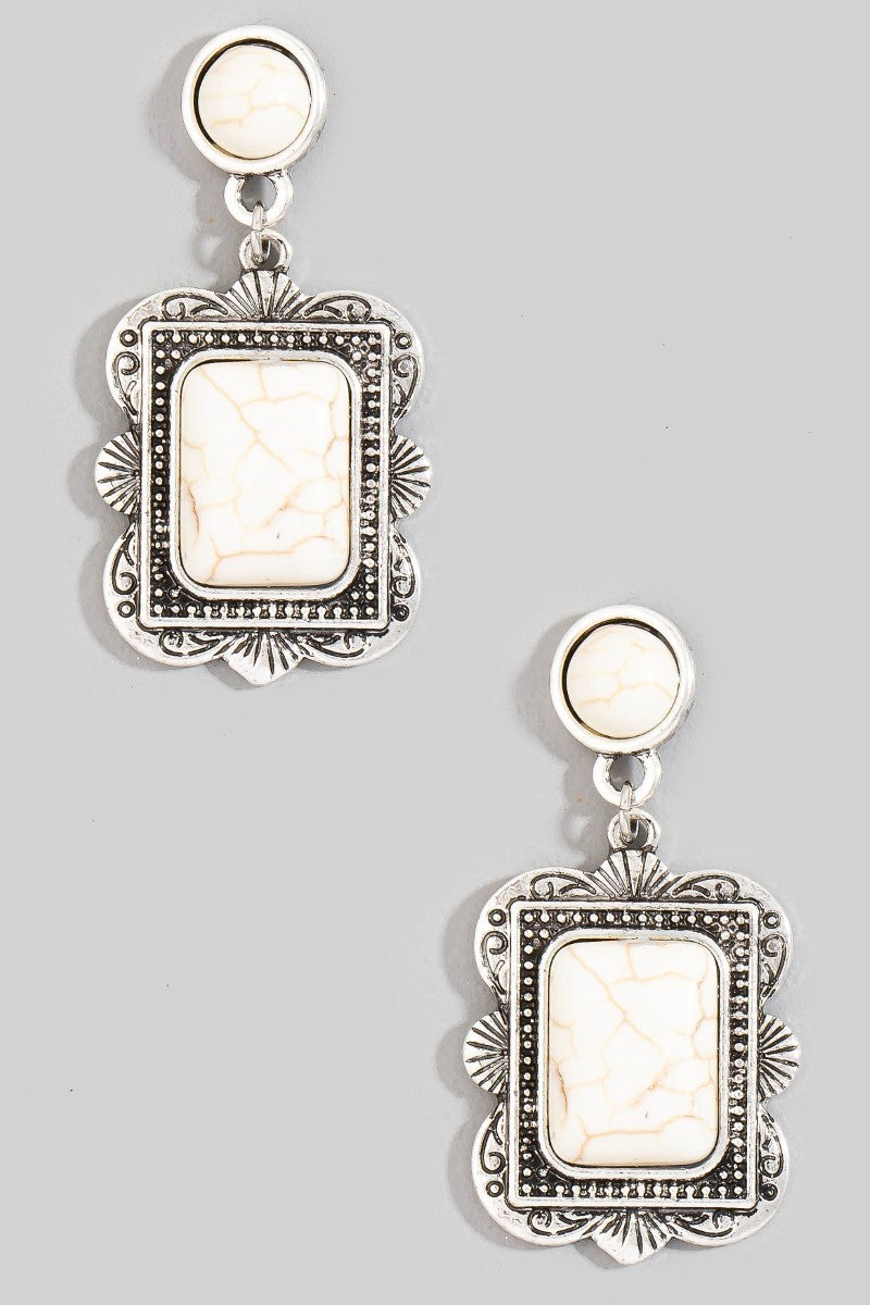 The Concho Rectangle Stone Drop Earrings in White Howlite - Product Shot on Grey Background Showing Pair of Antique Silver Rectangle Concho Drop Earrings with White Howlite Center Stones & Round Stud Posts