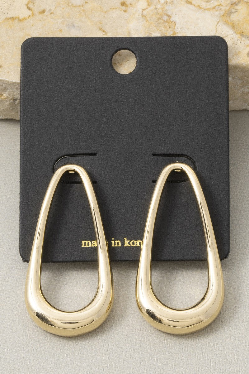 The Contour Open Teardrop Drop Earrings in Gold - Product Shot on Black Card Against Marble Background Showing Pair of Polished Gold Open Teardrop Earrings