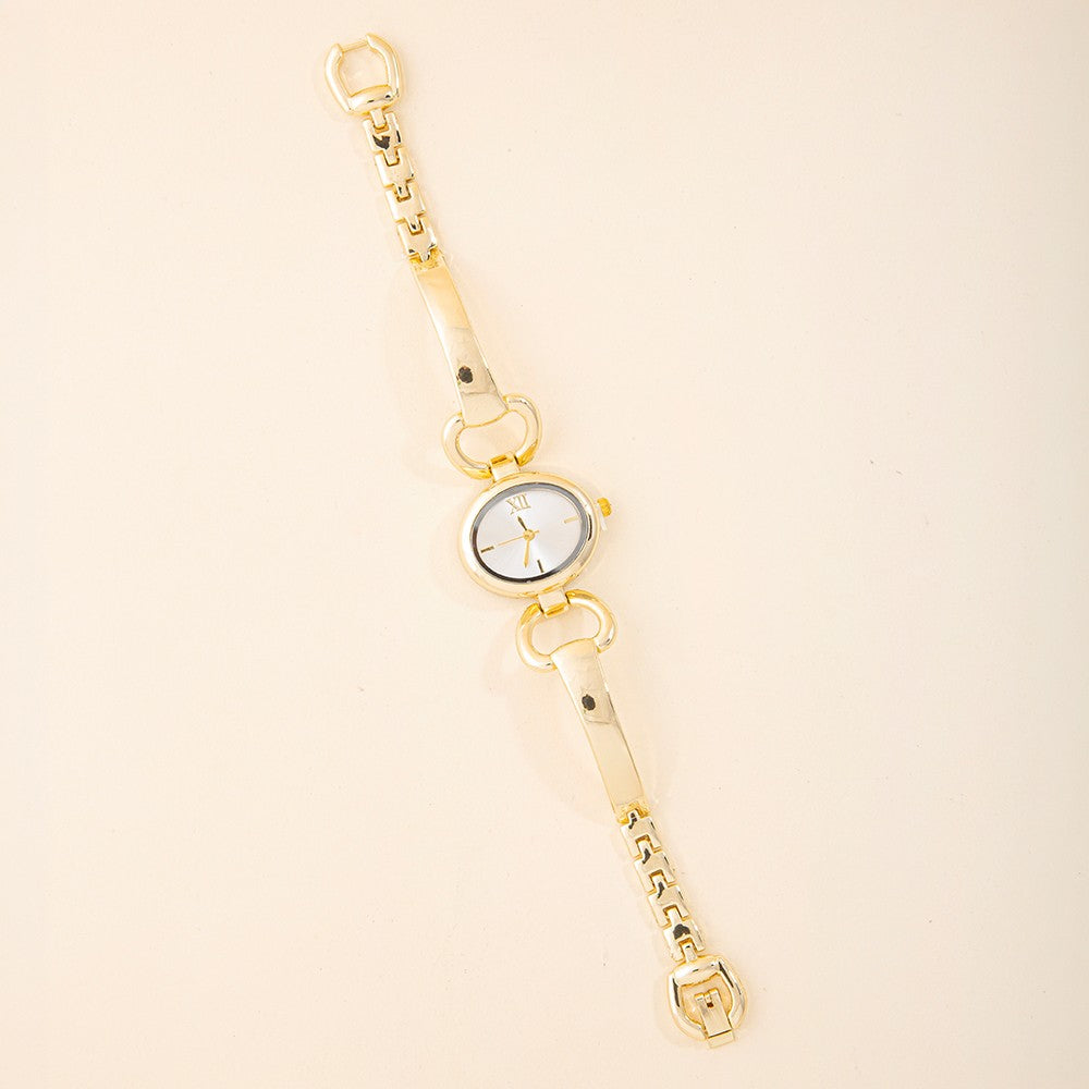 Gold Oval Case Roman Numeral Horsebit Link Bracelet Watch