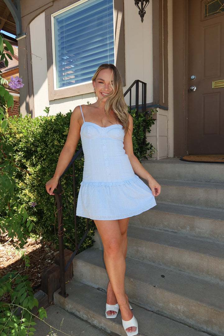 The Blue Eyelet Drop Waist Mini Dress