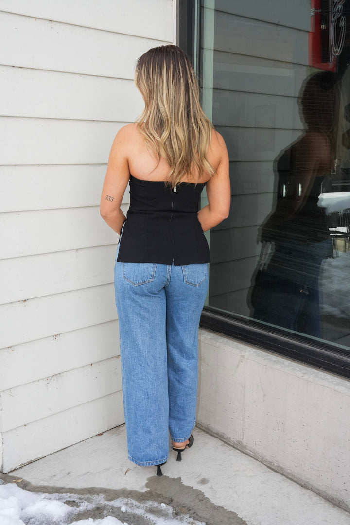 NOIR STRAPLESS PEPLUM TOP