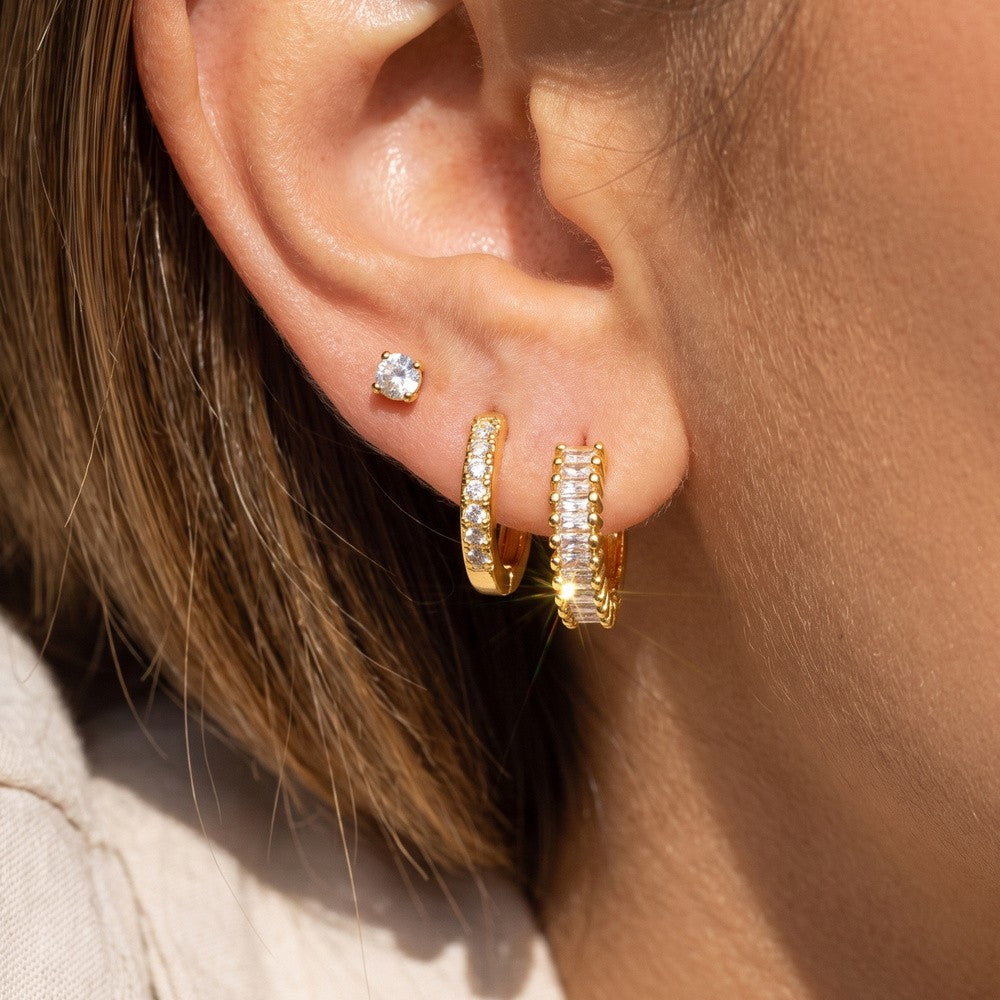 3 Pair Gold CZ Curated Ear Set — Sunburst Baguette Huggie, Milgrain Huggie & Solitaire Stud
