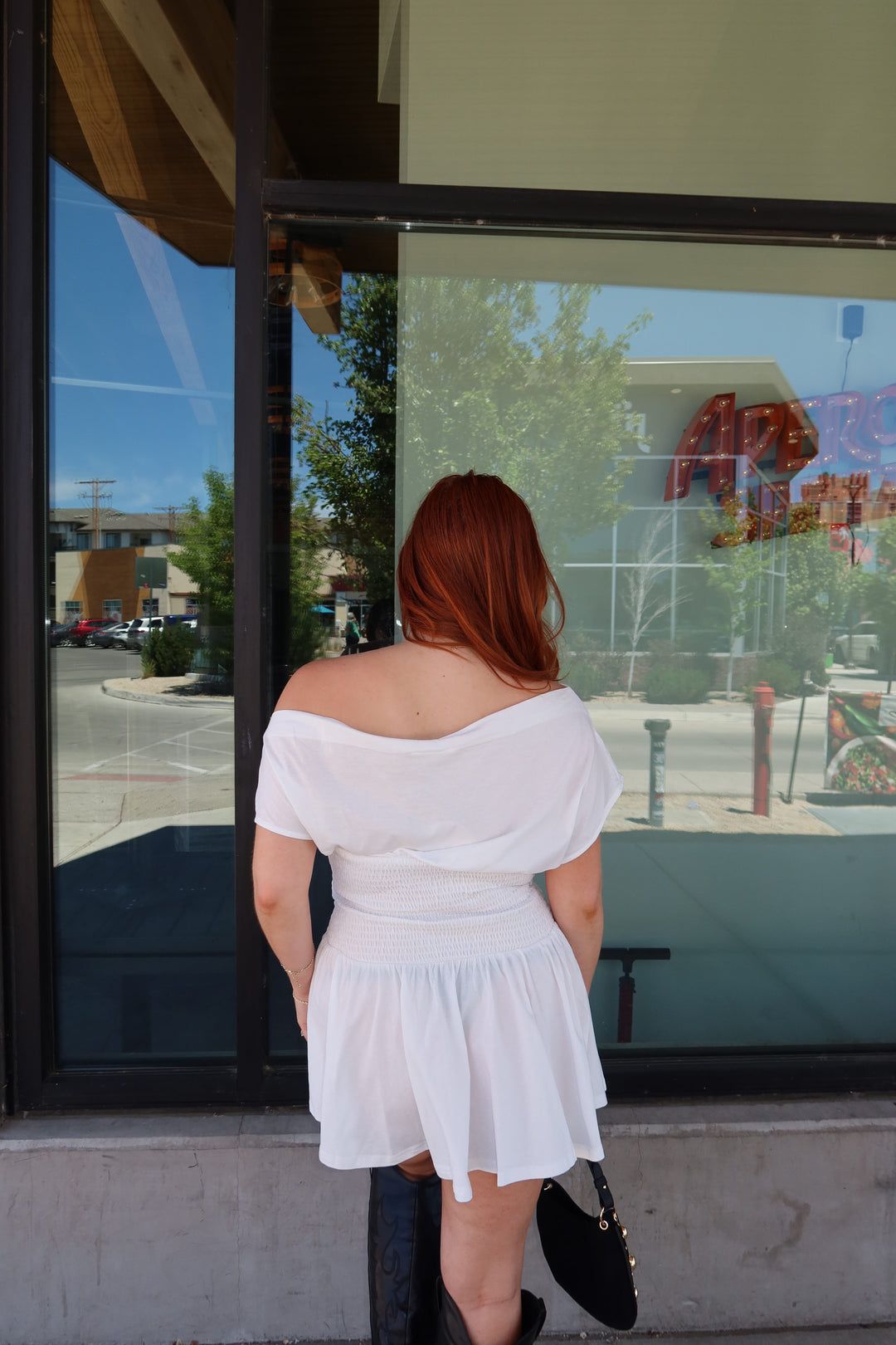 White Off-Shoulder Smocked Bodice Flared Mini Dress | The Asha